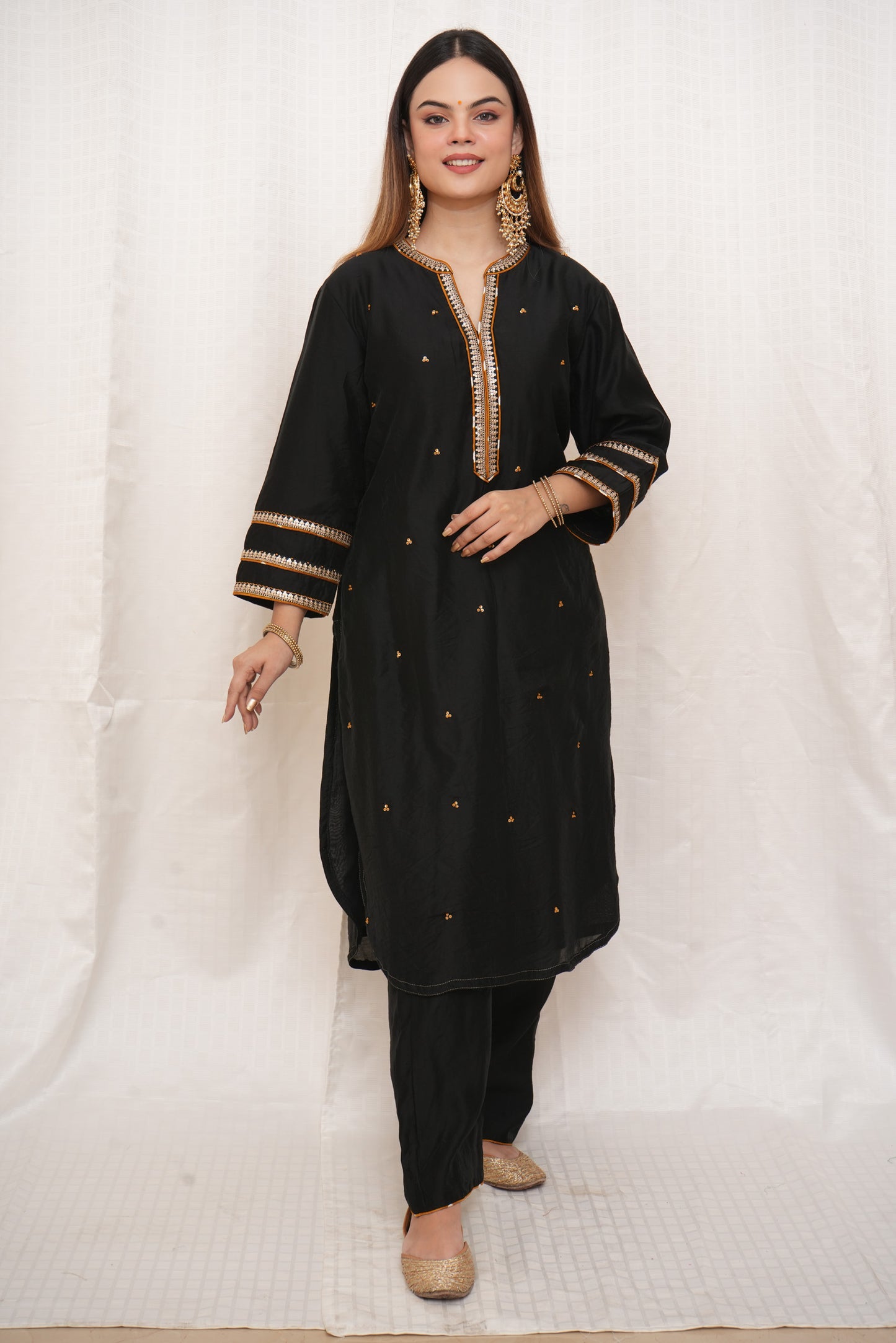 Black sequence embellished Chanderi suitset with yellow dupatta