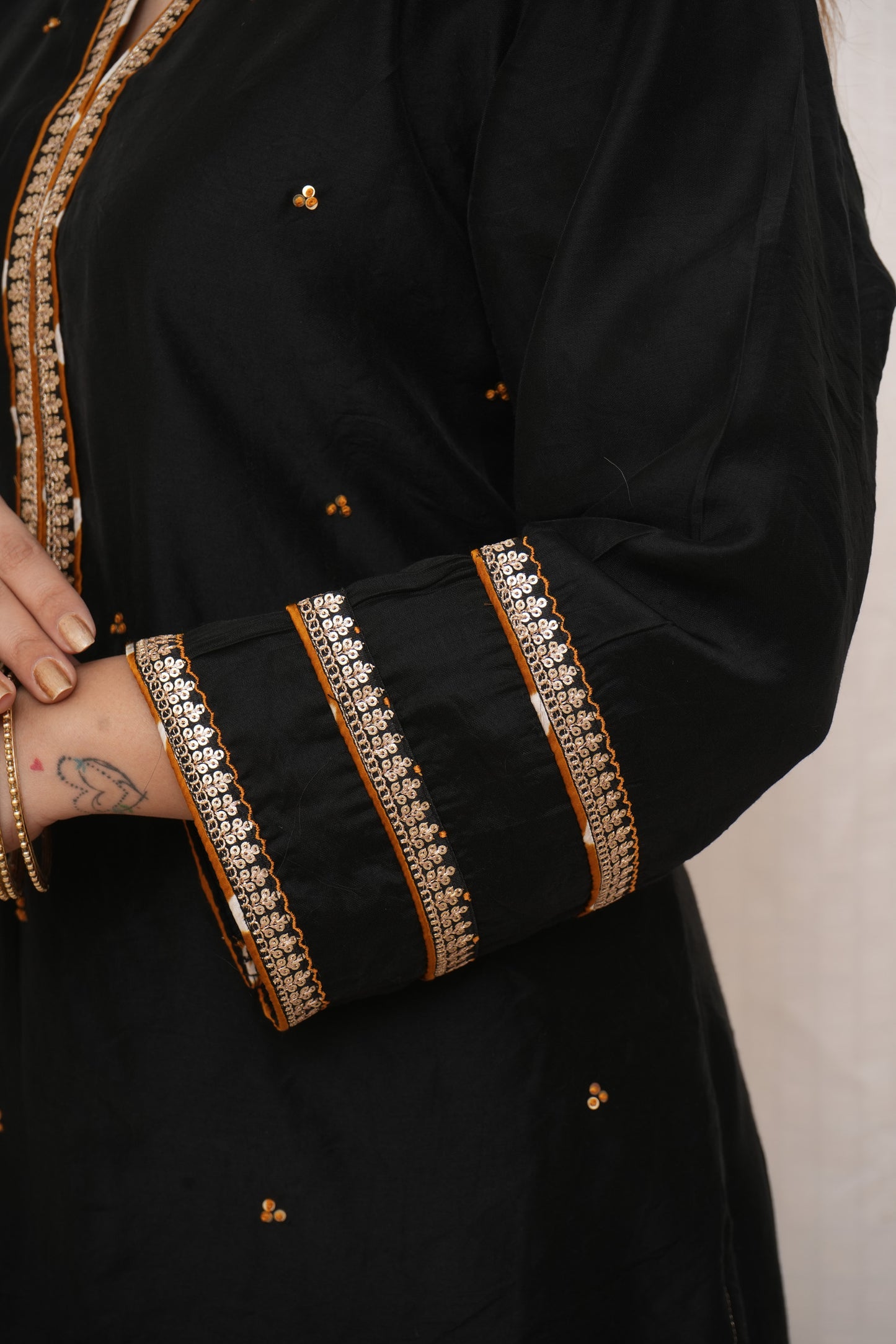 Black sequence embellished Chanderi suitset with yellow dupatta