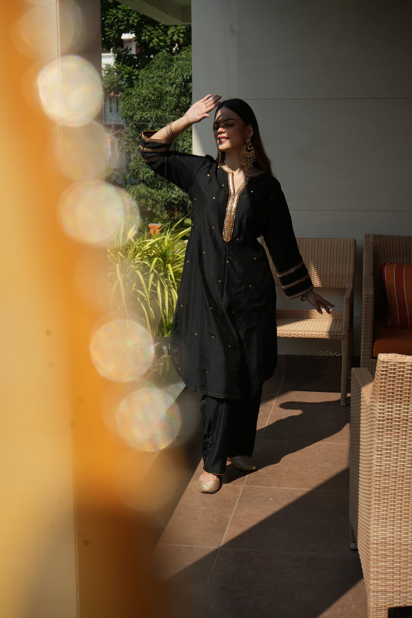 Black sequence embellished Chanderi suitset with yellow dupatta
