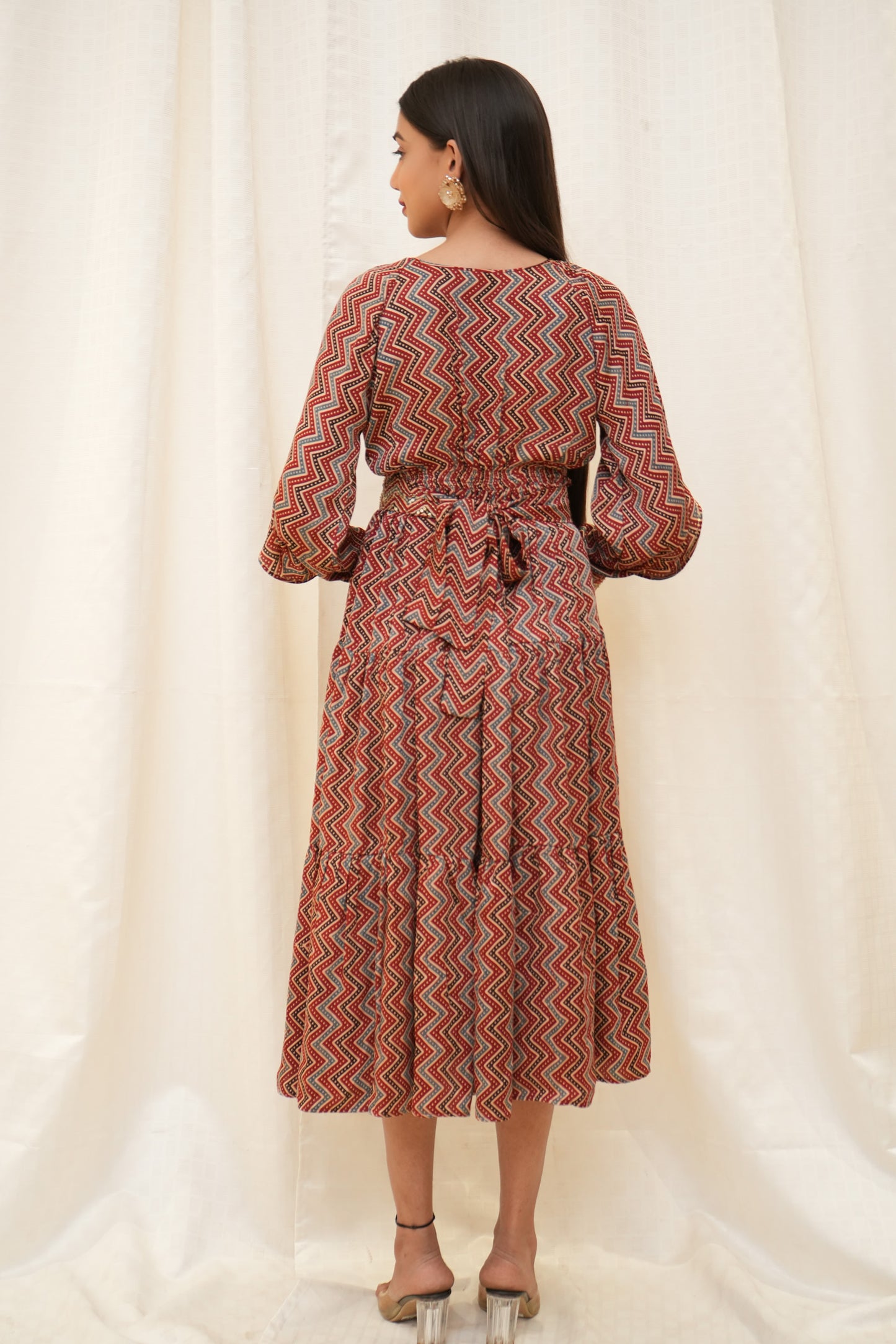Red Zigzag ajrakh sequence embellished petal sleeve tier dress