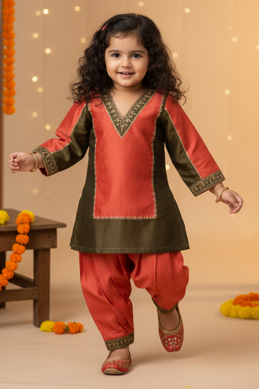Child in traditional outfit with decorative background