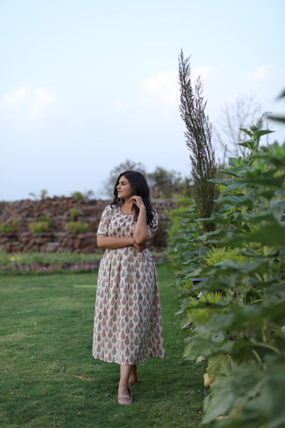 White leaf print dress with hand embroidery on neck