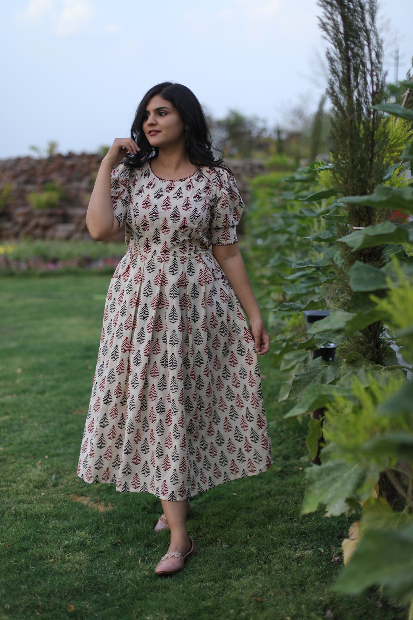White leaf print dress with hand embroidery on neck