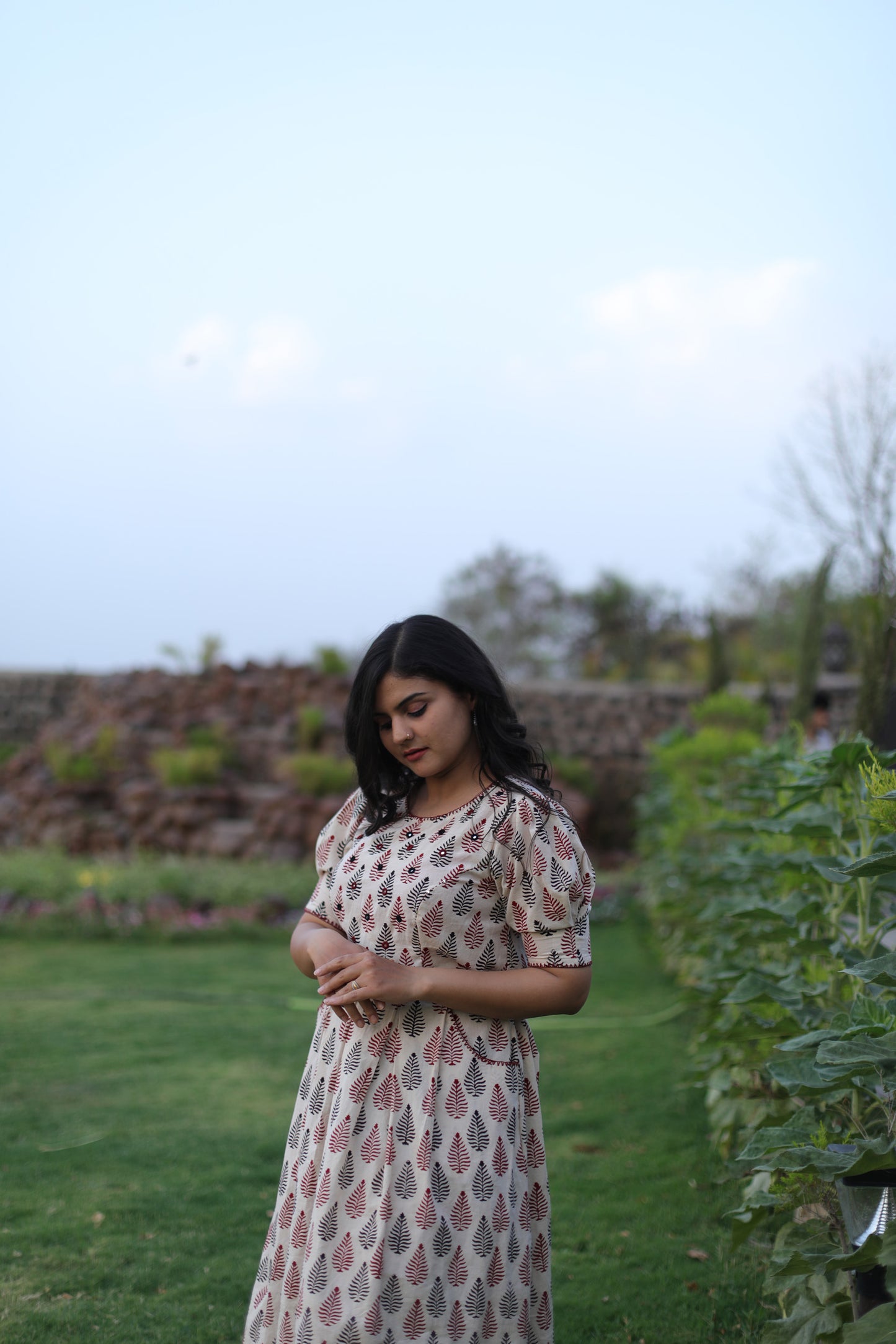 White leaf print dress with hand embroidery on neck