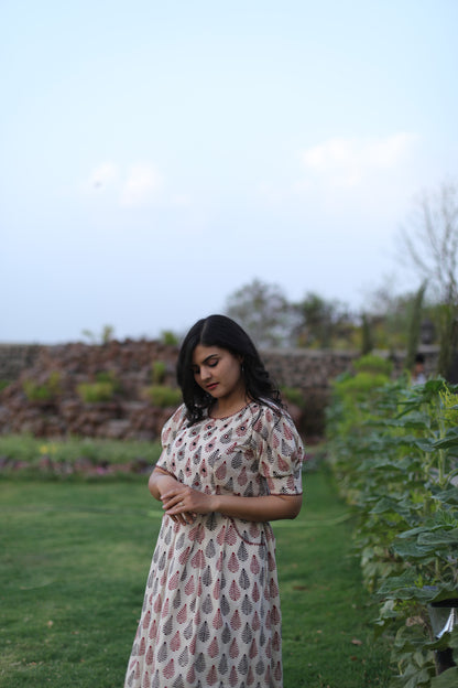 White leaf print dress with hand embroidery on neck