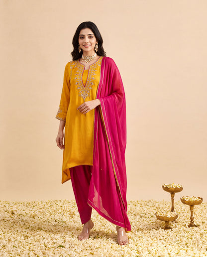Yellow Modal Satin suit with Hot pink Farshi salwar and Hot Pink Georget Dupatta