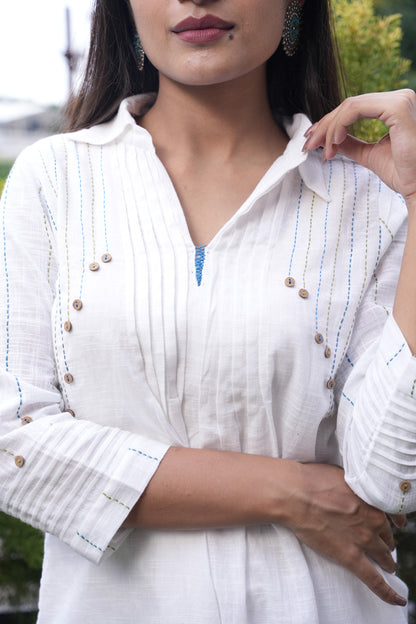 White cordset with hand embroidery