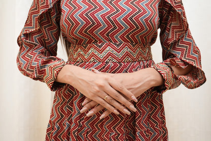 Red Zigzag ajrakh sequence embellished petal sleeve tier dress