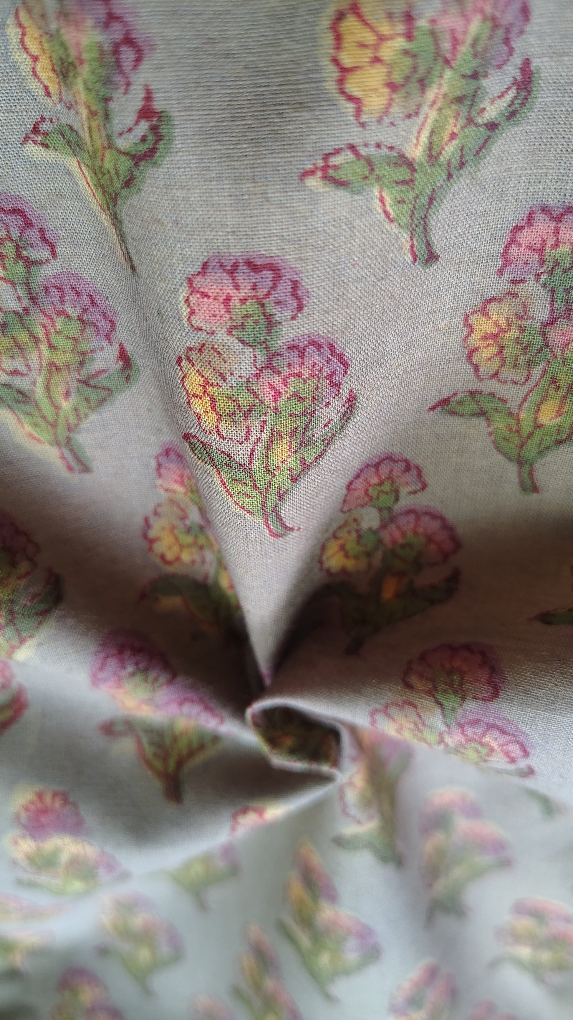 Close-up of floral fabric with a gray background