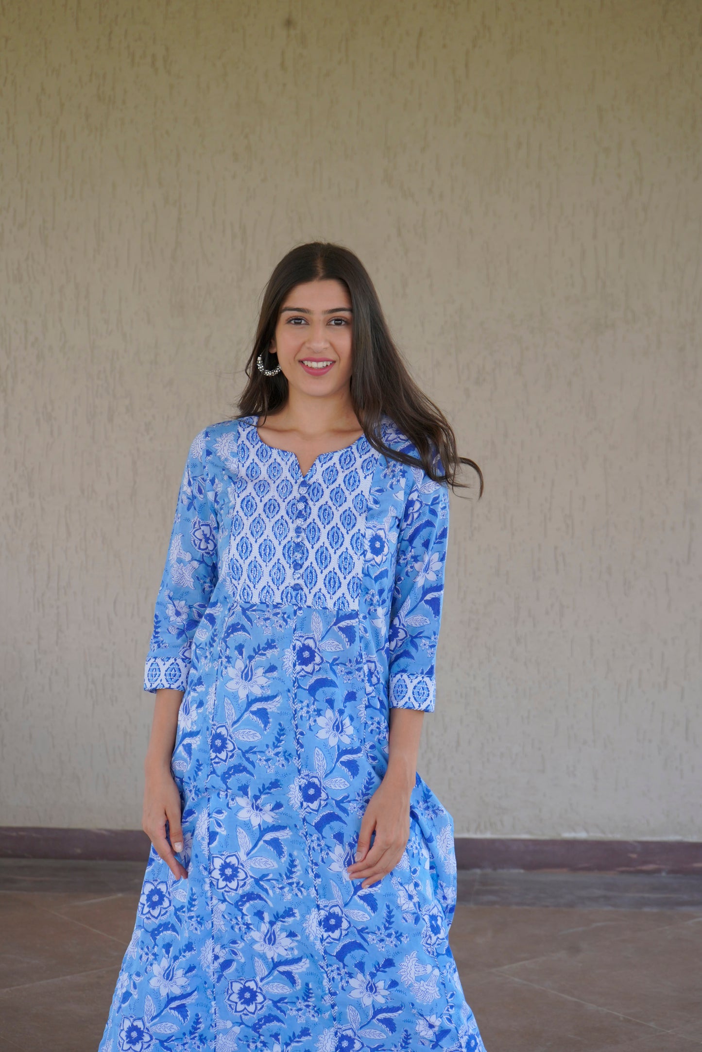 Blue cotton kurta with floral print and embellished yoke