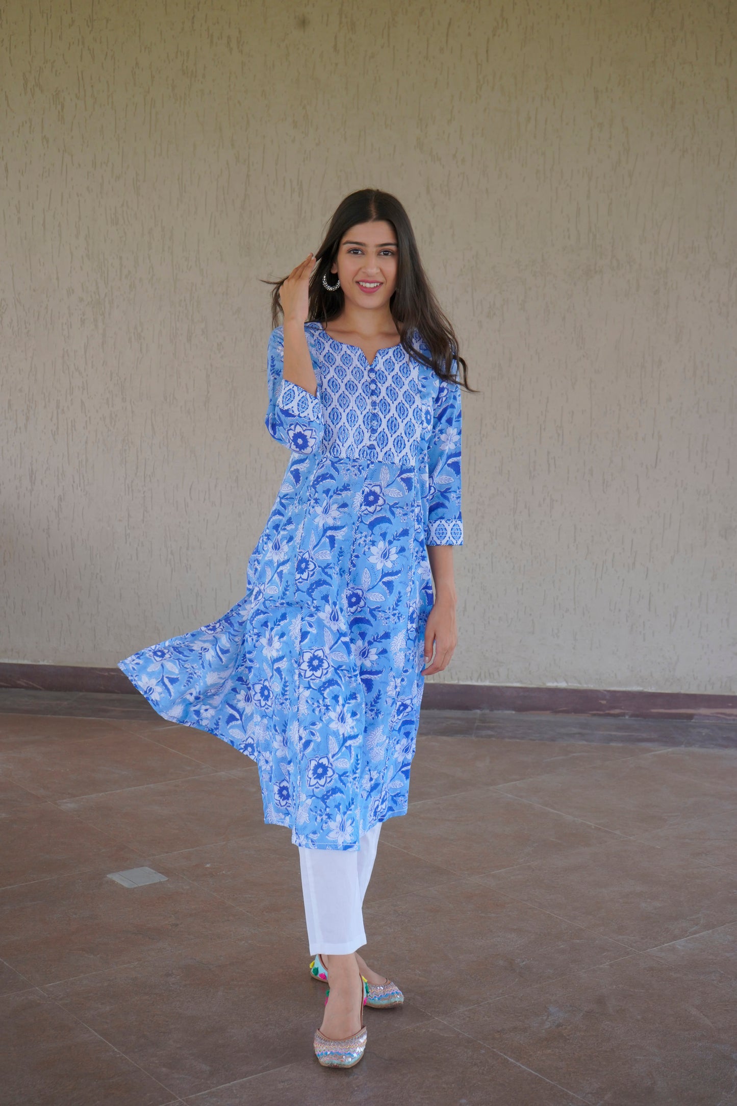 Blue cotton kurta with floral print and embellished yoke